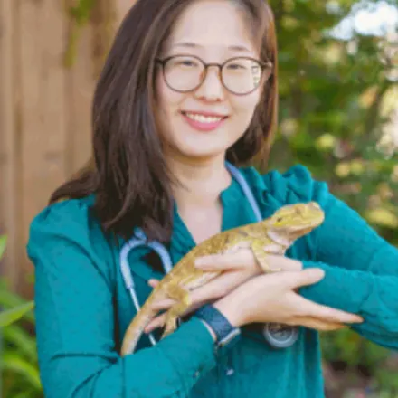 Youna Jeon holding a reptile